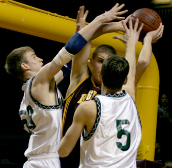  Holy Family's Andy Weingart and Trent Johnson were instrumental in clamping down on Bagley's scorers on Thursday.